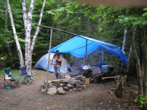 Farm Island campsite with fireplace, picnic table and tent